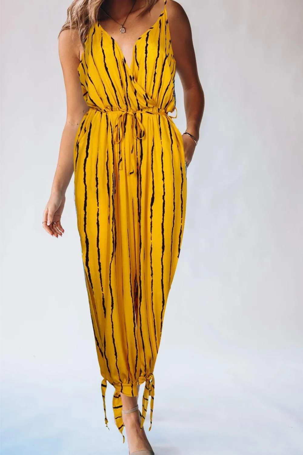 Beaming Sleeveless Tapered Leg Jumpsuit