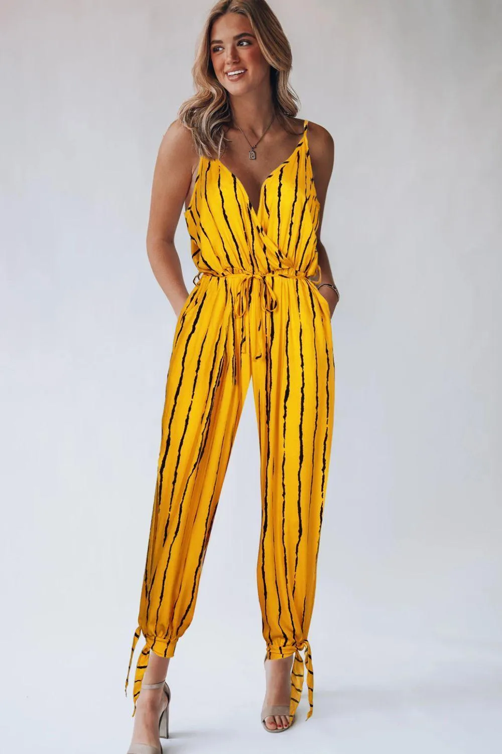 Beaming Sleeveless Tapered Leg Jumpsuit