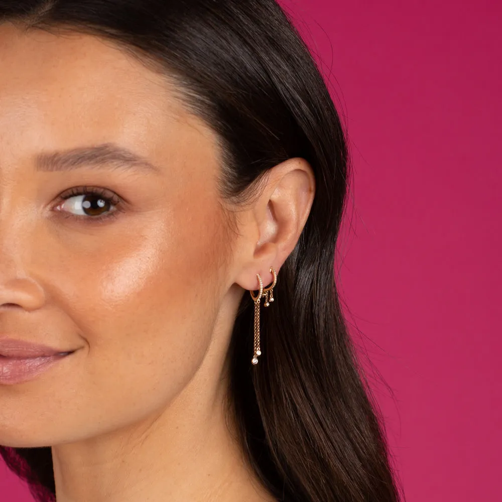 Diamond Bezel Dangling Huggie Earring 14K by By Adina Eden