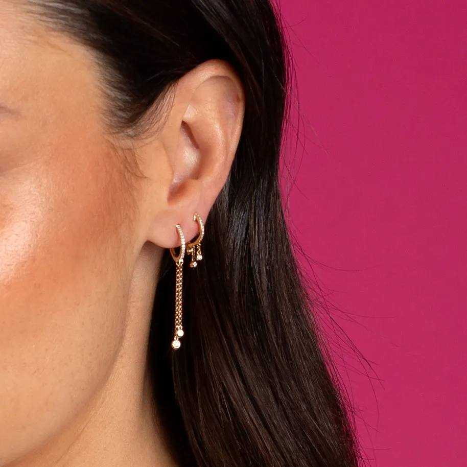 Diamond Bezel Dangling Huggie Earring 14K by By Adina Eden